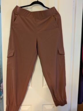 Apana Chest-Logo Cargo Pants in Rich Brown